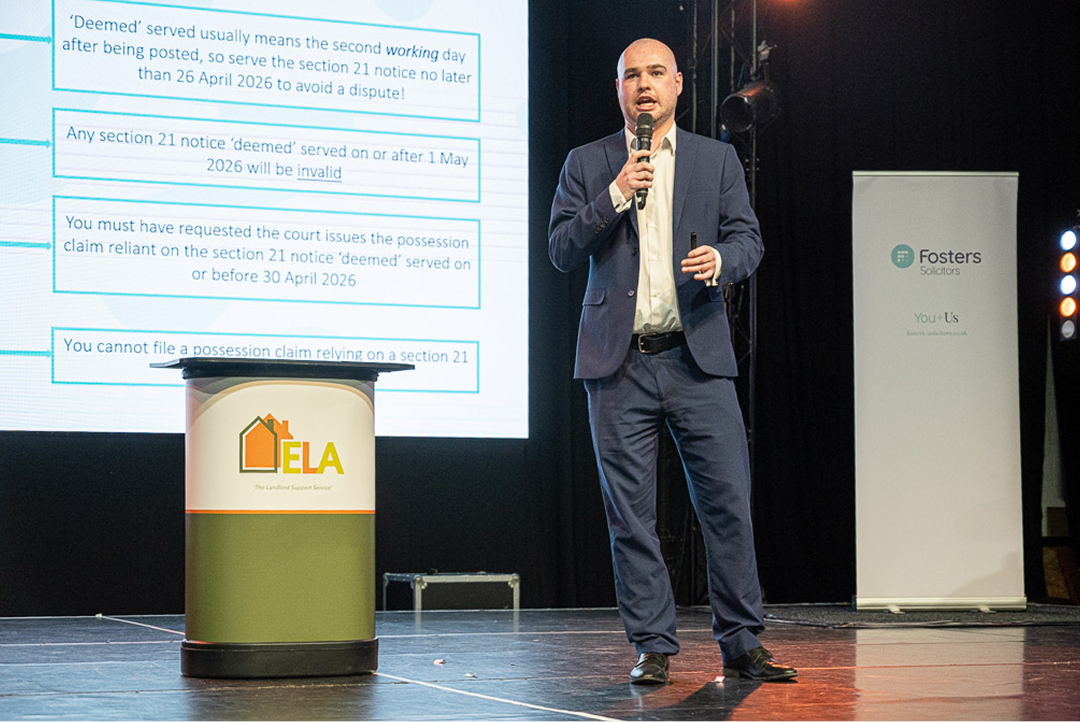Fosters Solicitors representative presenting on stage at a landlord and letting agents conference