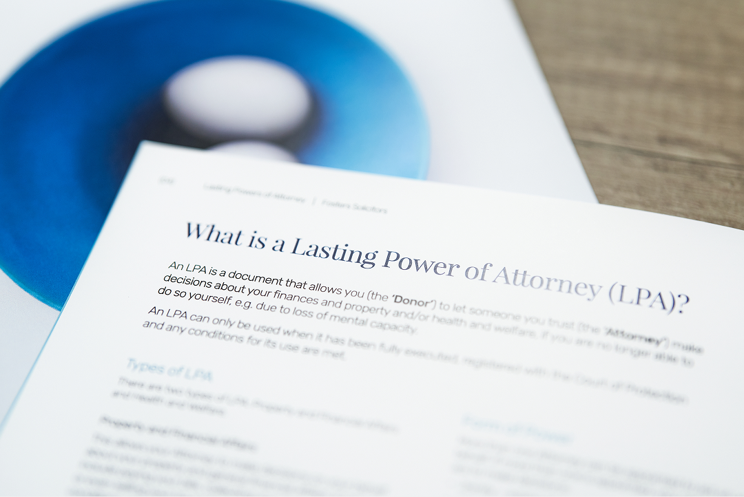 Document titled 'What is a Lasting Power of Attorney (LPA)?' on a desk